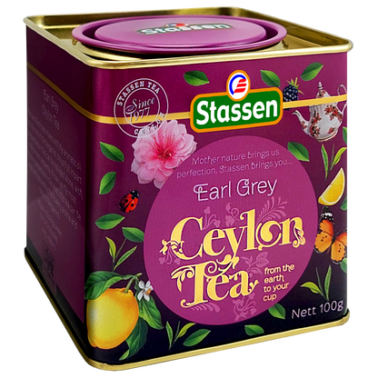 Czarna herbata Stassen Earl Grey w eleganckim opakowaniu z motywem kwiatów i cytrusów.
