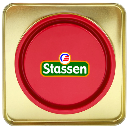 Czerwone wieczko puszki herbaty Stassen Tropical Mix z logo producenta.