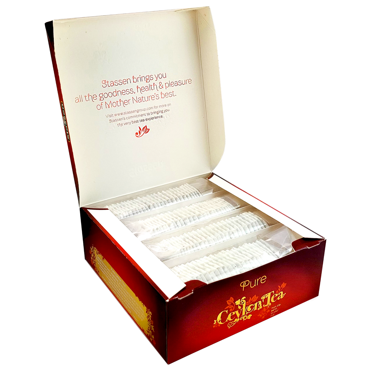 Otwarta herbata Stassen Pure Ceylon Tea z widocznymi kopertami w środku