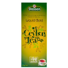 Opakowanie herbaty Stassen Liquid Gold Tea z filiżanką naparu – aromatyczna herbata cejlońska.
