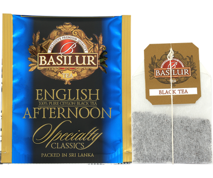 Saszetka herbaty Basilur English Afternoon w złoto-niebieskiej kopercie i torebka z logo Basilur.