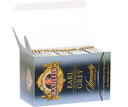 Otwarte pudełko herbaty Basilur Earl Grey z widocznymi kopertami z torebkami herbaty, klasyczna czarna herbata cejlońska z bergamotką.