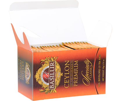 Otwarte opakowanie Basilur Ceylon Premium z kopertami herbaty.