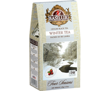 Opakowanie herbaty Basilur Winter Tea – bok z opisem i grafiką zimowego krajobrazu.