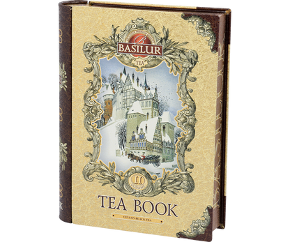 Puszka Basilur Tea Book vol. II – bok z logo marki i motywem zimowego zamku.