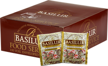 Opakowanie herbaty Basilur White Magic z widocznymi saszetkami zielonej herbaty cejlońskiej o kwiatowym aromacie.