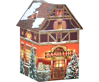 Herbata Basilur Christmas House z widokiem z lewej strony i ozdobną choinką