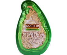 Zielona herbata Basilur Green w ozdobnej puszce w kształcie wyspy Cejlon.