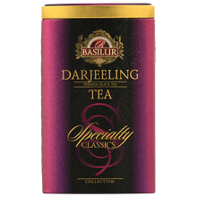 Bok puszki Basilur Darjeeling z logo i złotymi detalami.