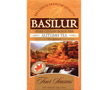 Pudełko herbaty Basilur Autumn Tea z jesiennym krajobrazem na etykiecie.
