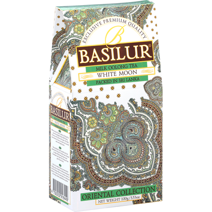 Bok pudełka Basilur White Moon z orientalnym motywem i eleganckim zdobieniem.