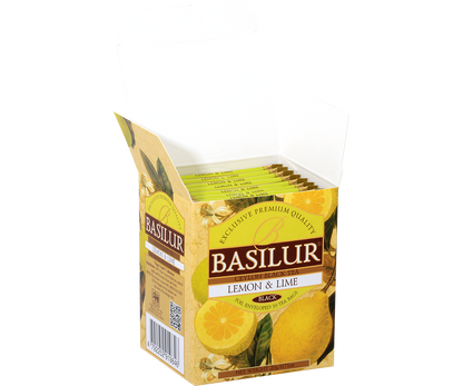 Otwarta paczka herbaty Basilur Lemon & Lime z widocznymi saszetkami w środku.