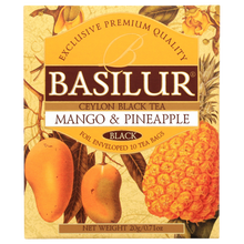 Opakowanie herbaty czarnej Basilur Mango & Pineapple z tropikalnym motywem.
