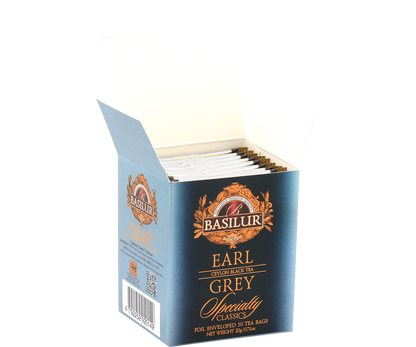 Otwarte pudełko Basilur Earl Grey z kopertami herbaty.
