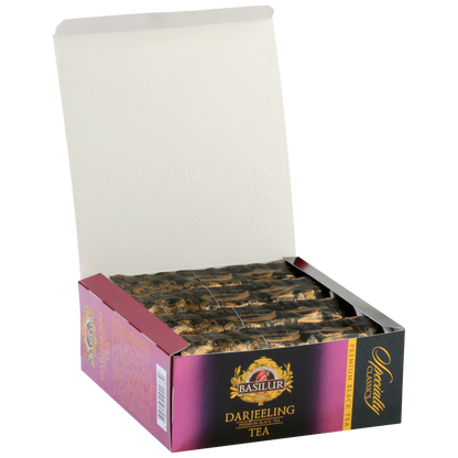 Otwarte pudełko Basilur Darjeeling – elegancko zapakowane torebki herbaty czarnej.