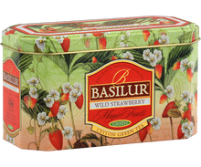 Boczne ujęcie puszki Basilur Wild Strawberry z ozdobnym nadrukiem owoców truskawki.