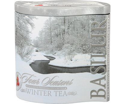 Zimowy pejzaż na puszce Basilur Winter Tea, idealna herbata na chłodne dni.