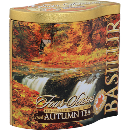 Bok puszki Basilur Autumn Tea z jesiennym pejzażem i logo marki