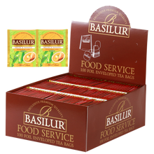 Herbata Basilur Melon & Banana w ekspozytorze typu food service, 100 kopertowanych torebek zielonej herbaty.
