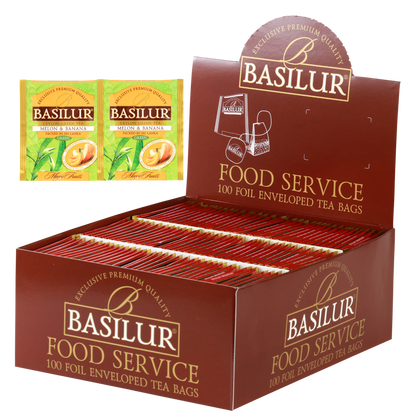 Herbata Basilur Melon & Banana w ekspozytorze typu food service, 100 kopertowanych torebek zielonej herbaty.
