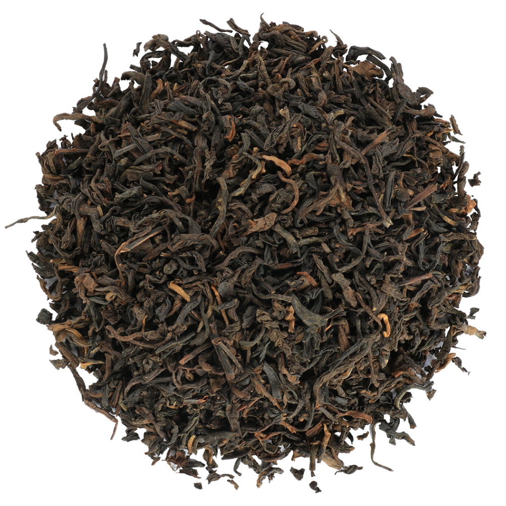 Liście czarnej herbaty Pu-Erh Basilur, naturalna fermentowana herbata o głębokim aromacie.