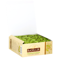 Otwarta paczka Basilur Ceylon Green z kopertami zielonej herbaty cejlońskiej
