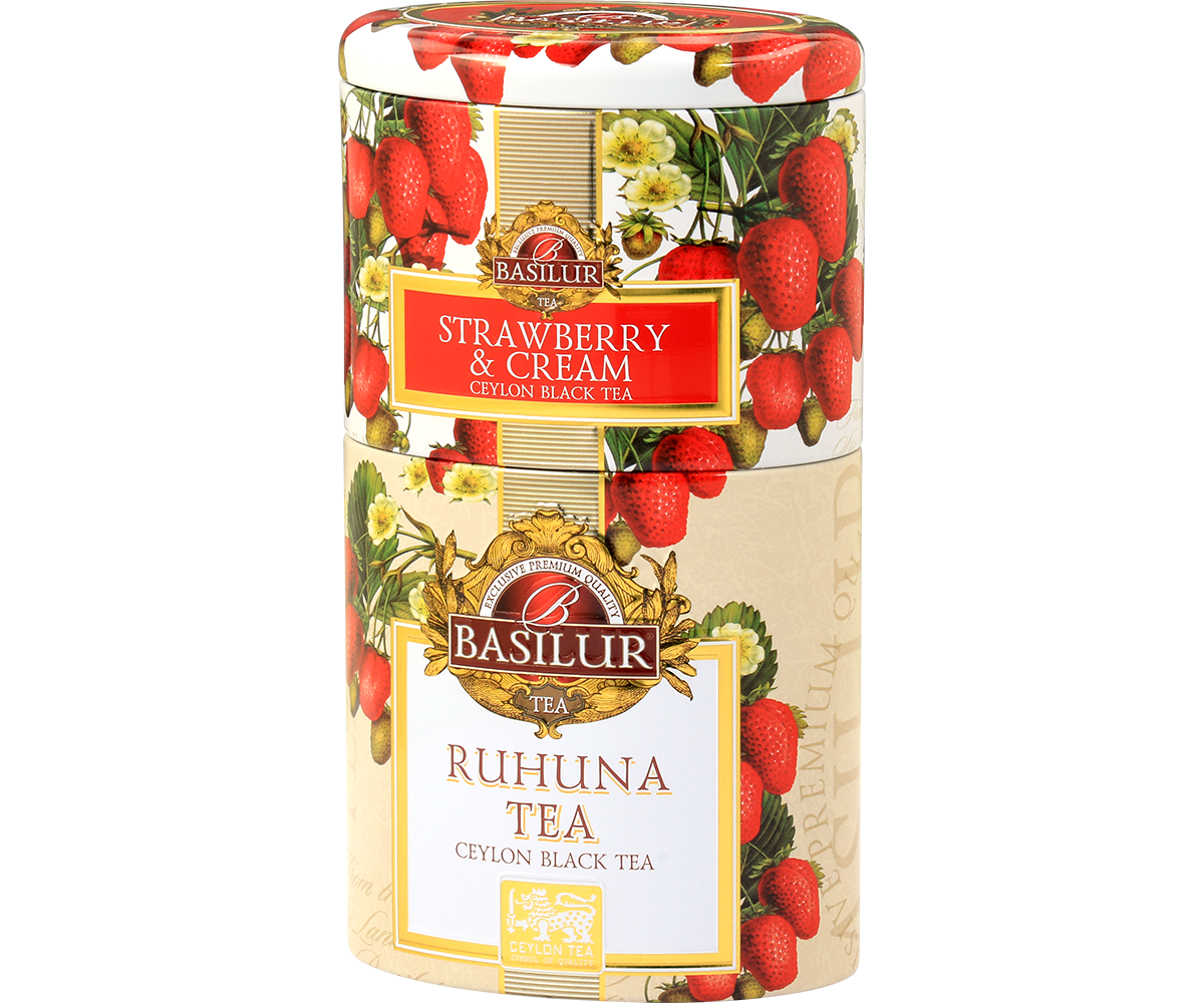 Puszka Basilur Strawberry & Cream oraz Ruhuna Tea z ozdobnym motywem truskawek.