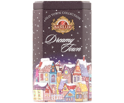 Zbliżenie na opakowanie herbaty Basilur Dreamy Town z kolorową ilustracją domków pod śniegiem.
