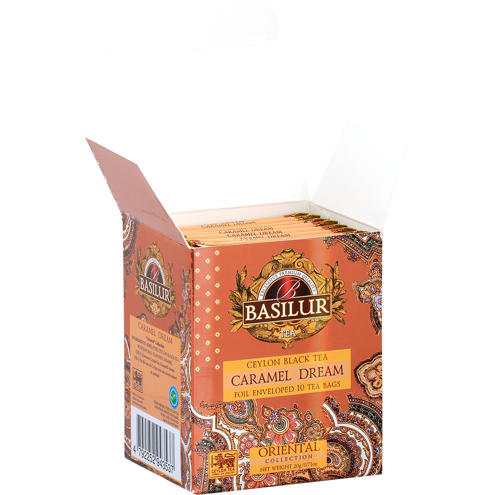 Otwarta paczka Basilur Caramel Dream z widocznymi kopertami herbaty czarnej