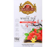 Front pudełka Basilur Strawberry Vanilla – elegancka biała herbata o aromacie truskawkowo-waniliowym.