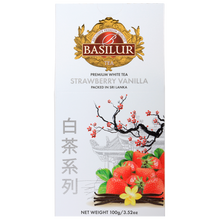 Front pudełka Basilur Strawberry Vanilla – elegancka biała herbata o owocowo-waniliowym aromacie.