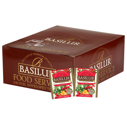 Opakowanie zbiorcze Basilur Cranberry z widocznymi saszetkami herbaty owocowej o smaku żurawiny.