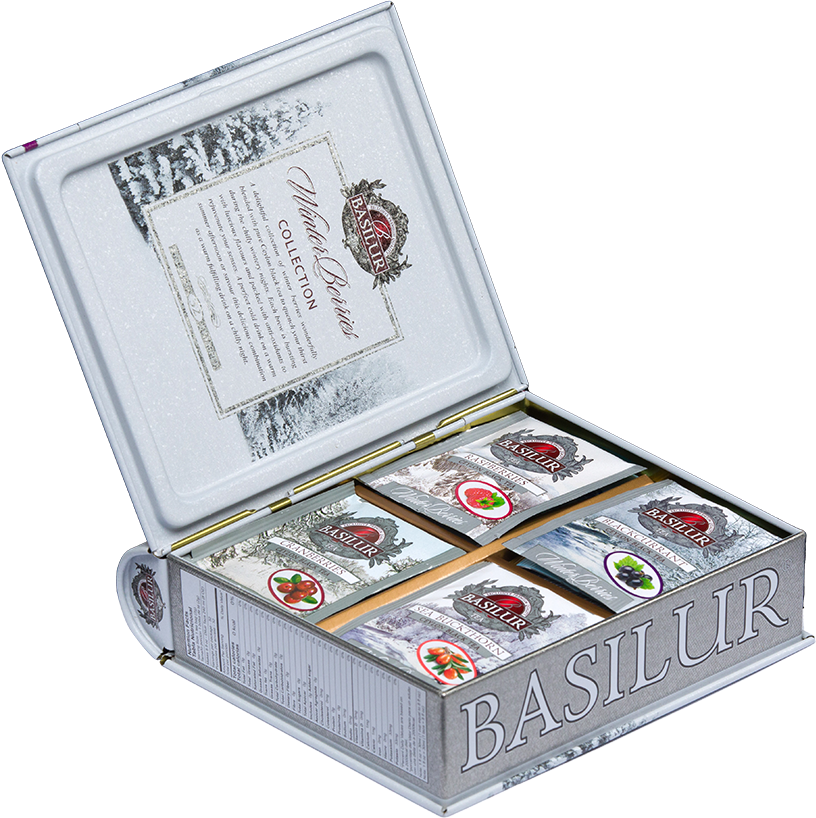 Zestaw herbat Basilur Winter Berries otwarty, widoczne saszetki o różnych smakach.