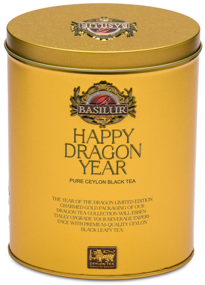 Herbata Basilur Happy Dragon Year z wizerunkiem smoka i kwiatami na złotym tle.