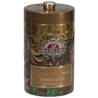 Puszka Basilur Golden Moments Amber Glow w złotym kolorze z eleganckim świątecznym zdobieniem.