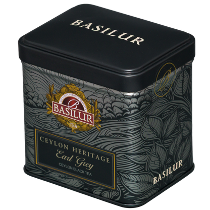 Czarna metalowa puszka Basilur Earl Grey Ceylon Heritage, ujęcie pod kątem z widocznym wieczkiem