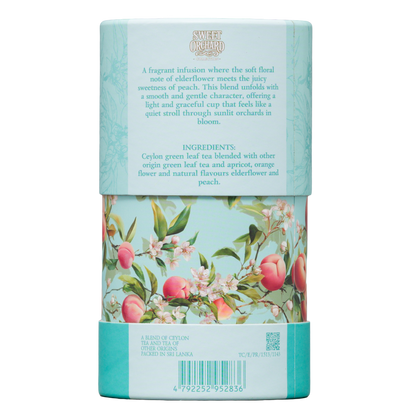 Herbata zielona Basilur Peach & Elderflower w dekoracyjnej tubie, widok opakowania od tyłu ze składem produktu.