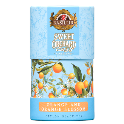 Herbata czarna Basilur Orange and Orange Blossom w niebieskiej ozdobnej tubie z motywem pomarańczy i kwiatów.