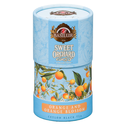 Dekoracyjna tuba herbaty czarnej Basilur Orange and Orange Blossom pokazana pod kątem.
