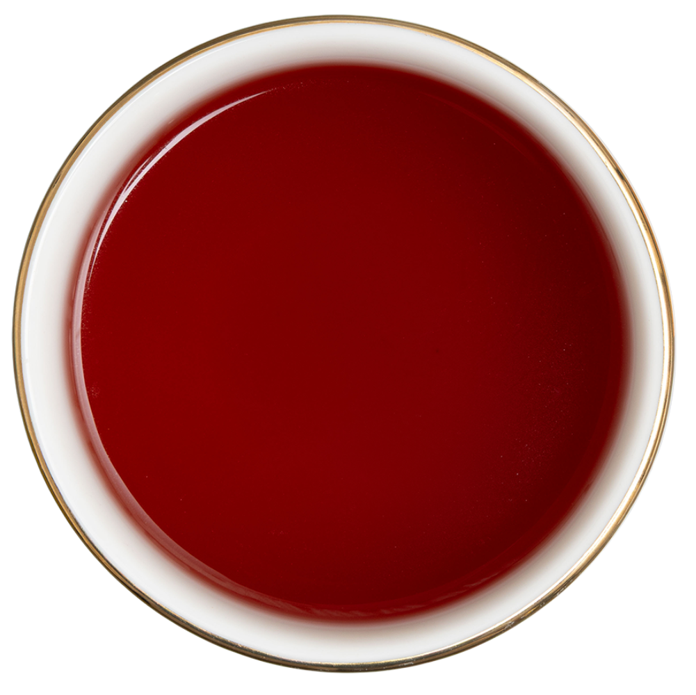 Czerwony napar Basilur Frosty Cranberry z hibiskusem i rooibosem w filiżance