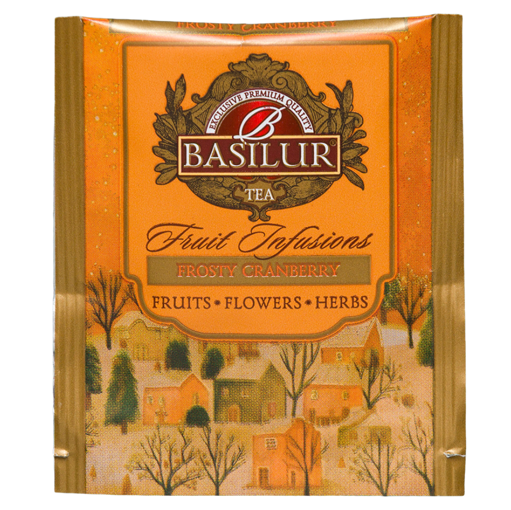 Pojedyncza pomarańczowa koperta herbaty Basilur Frosty Cranberry z zimową ilustracją