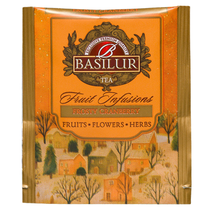 Pojedyncza pomarańczowa koperta herbaty Basilur Frosty Cranberry z zimową ilustracją