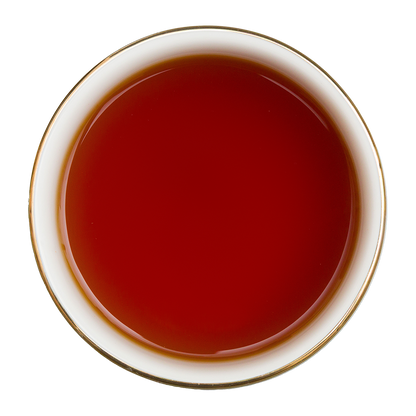 Czerwono-bursztynowy napar z czarnej herbaty Basilur Crimson Red z mango i wiśnią