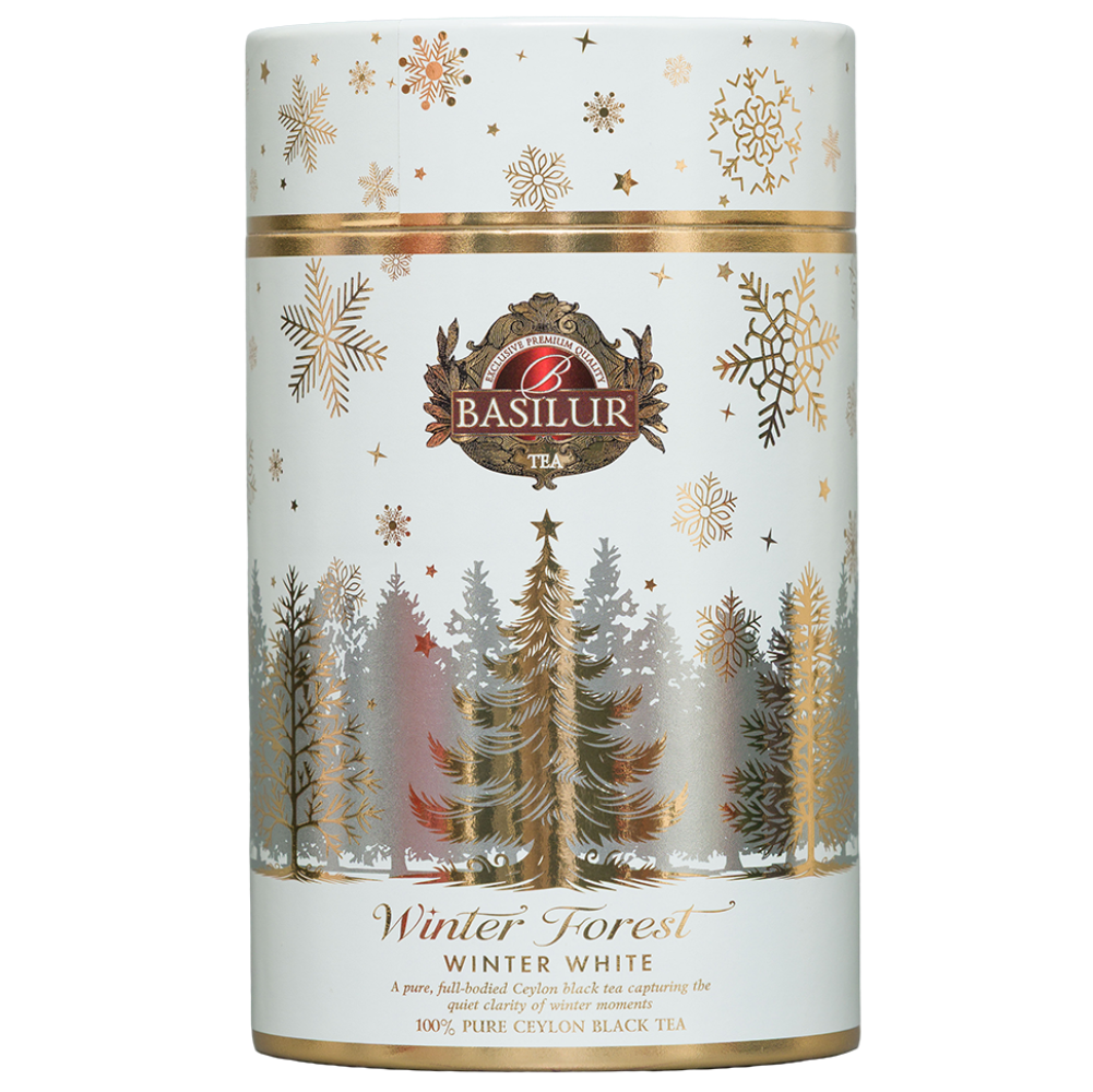 Basilur Winter White 75 g, front białej zimowej tuby z motywem złotego lasu