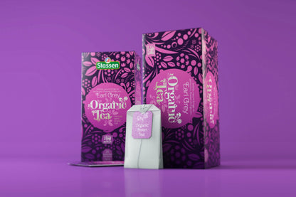 Zestaw Stassen Organic Earl Grey – pudełko i torebka na tle fioletowym