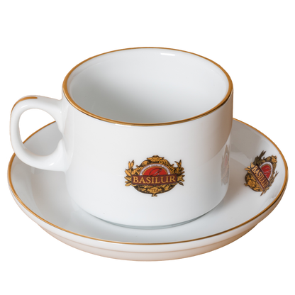 Filiżanka Basilur ze spodkiem, widok z boku, porcelana zdobiona złotym rantem.