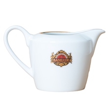 Porcelanowy mlecznik Basilur 320 ml biały z logo marki i złotym wykończeniem
