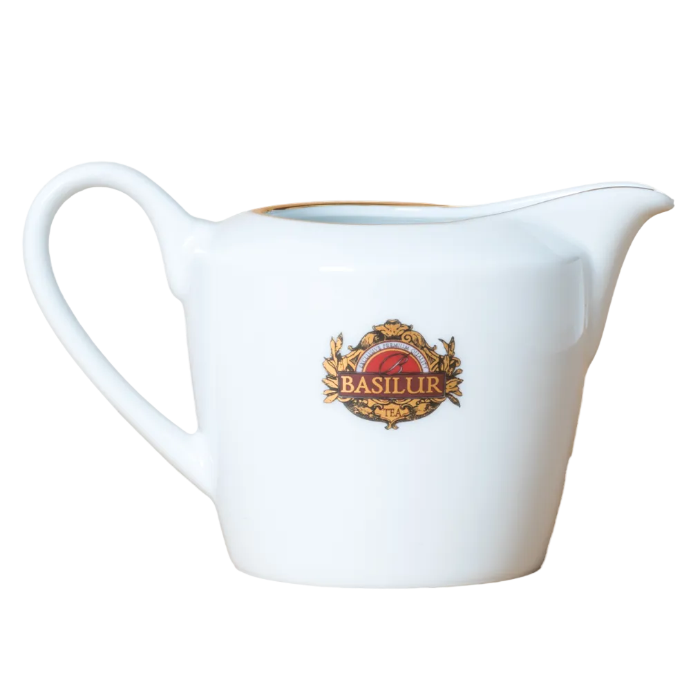 Porcelanowy mlecznik Basilur 320 ml biały z logo marki i złotym wykończeniem

