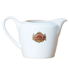 Porcelanowy mlecznik Basilur 320 ml biały z logo marki i złotym wykończeniem
