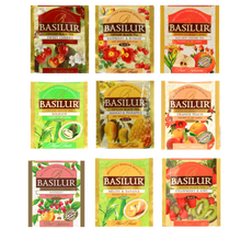 Dziewięć saszetek Basilur w różnych wariantach, m.in. wiśnia, malina, mango z ananasem, pomarańcza z brzoskwinią i truskawka z kiwi